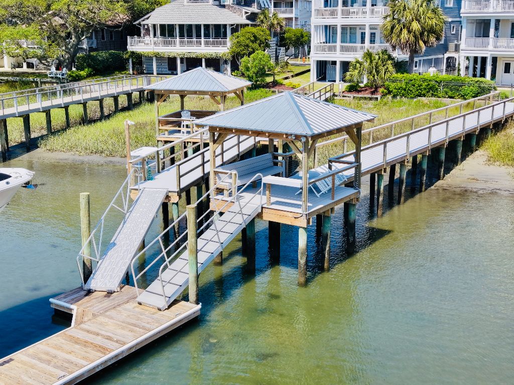 Dock with floating platform, aluminum gangway, and covered gazebo with seating
